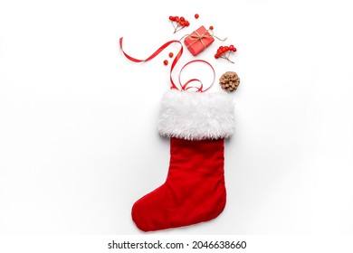 Composition with Christmas sock on white background - Powered by Shutterstock