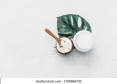 Composition with coconut products, body care concept, coconut oil on white background
