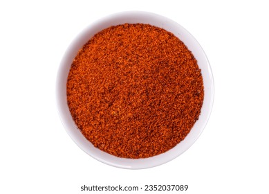 Composition consisting of variations of spices in white bowls and metal spoons on a dark concrete background - Powered by Shutterstock