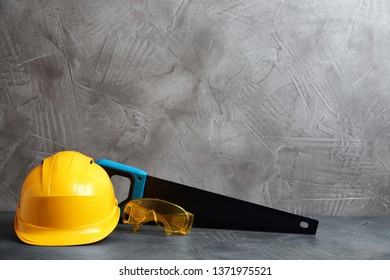 Composition With Construction Tools On Grey Table, Space For Text