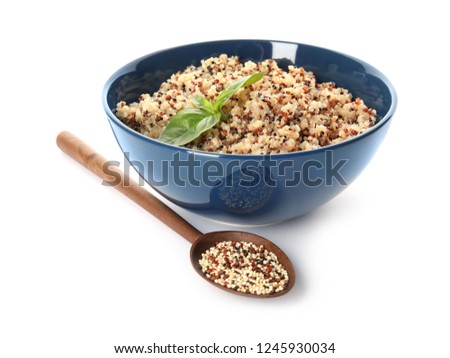 Composition with cooked quinoa in bowl isolated on white