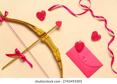 Composition with cupid's bow, envelope and hearts on color background. Valentine's Day celebration