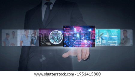 Composition of data processing over caucasian man handin background. global technology, digital interface, connection and communication concept digitally generated image.