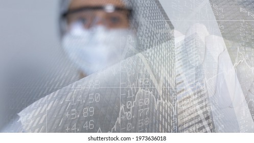 Composition of data processing over doctor in face mask. global covid 19 pandemic, medicine, digital interface and data processing concept digitally generated image.