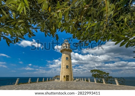 A composition depicting the Democracy Lighthouse on Yassıada Island, formerly known as the Island of Democracy and Freedoms, located in the Marmara Sea off Istanbul.