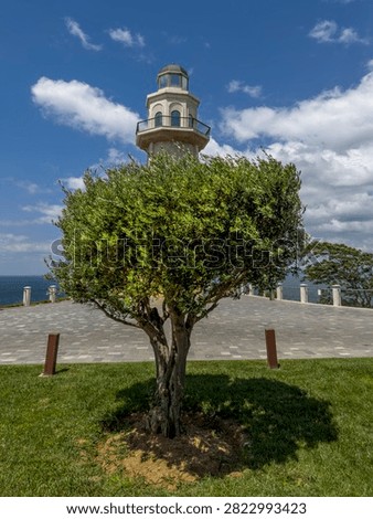 A composition depicting the Democracy Lighthouse on Yassıada Island, formerly known as the Island of Democracy and Freedoms, located in the Marmara Sea off Istanbul.