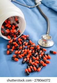 Composition With Dietary Supplement Capsules And Containers  With Stetoscope . Variety Of Drug Pills