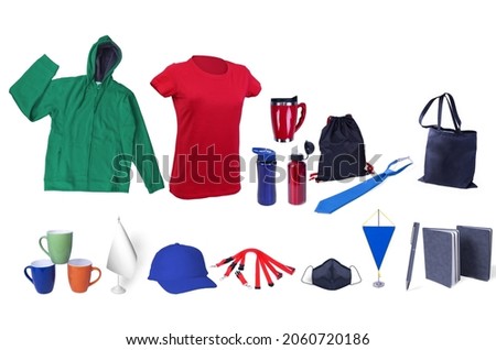 Composition of different promo products-Thermo cups-T-shirt-Hoodie sweatshirt-tie-pen-notebook paper-Lanyards Neck Strap-Mask covid-19-cap-cups tea-tote bag-Pennant-backpack-Table flag-Isolated