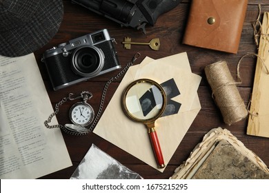 Composition with different vintage items on wooden background. Detective layout
