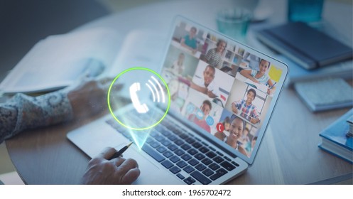 Composition of digital interface with call icon over businessman on laptop video call. global networking, communication and technology concept digitally generated image.