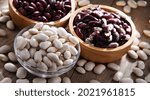 Composition with dried beans on the table.