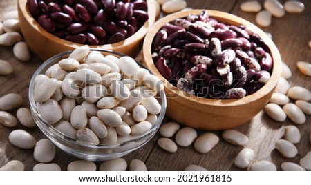 Composition with dried beans on the table.