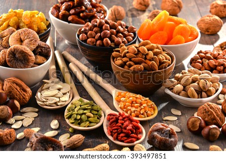 Composition with dried fruits and assorted nuts.