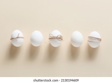 Composition with Easter eggs on beige background