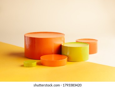 Composition with empty circle shape podiums for products presentation or exhibitions. Abstract background of different colorful geometric objects