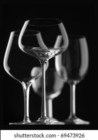 Composition With Empty Wine Glasses On Black Background