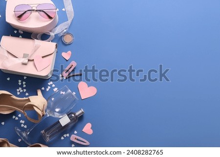 Composition with female accessories, shoes, wine glass and decor on color background.Valentine's Day celebration
