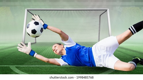 Composition of female goalkeeper catching ball at football stadium. sport and competition concept digitally generated image. - Powered by Shutterstock