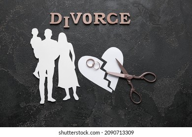 Composition with figures of family and word DIVORCE on dark background