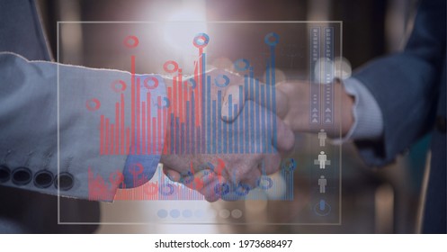 Composition of financial data processing on screen over businessman handshake. global business, success and digital interface concept digitally generated image.