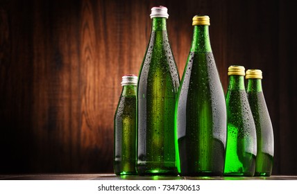 Composition With Glass Bottles Of Mineral Water.