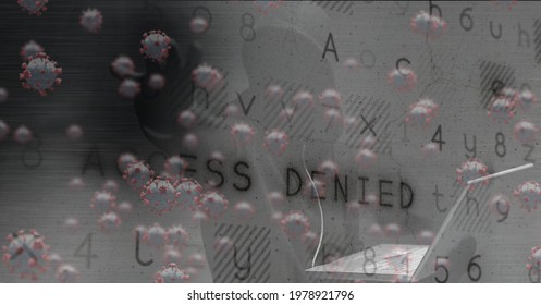 Composition of hooded hacker using laptop with covid cells and access denied message on screen. global coronavirus pandemic and cyber security concept digital