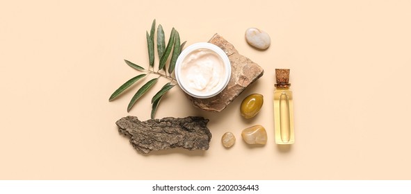 Composition With Jar Of Natural Olive Cream And Oil On Beige Background