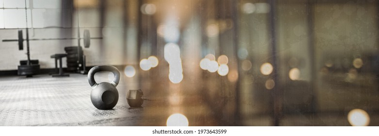 Composition of kettlebell on gym floor with blurred grey light. exercise, gym equipment and active lifestyle concept digitally generated image. - Powered by Shutterstock