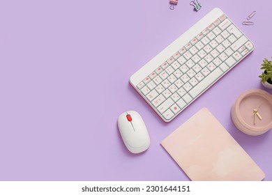 Composition with keyboard, mouse, clock and notebook on lilac background - Shutterstock ID 2301644151