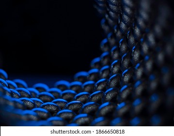 Composition from magnetic metal balls in blue light. Macro close up.