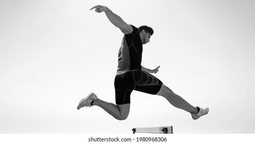 Composition Of Male Hurdle Jumper With Copy Space In Black And White. Sport And Competition Concept Digitally Generated Image.