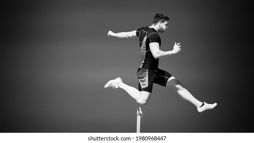 Composition Of Male Hurdle Jumper With Copy Space In Black And White. Sport And Competition Concept Digitally Generated Image.