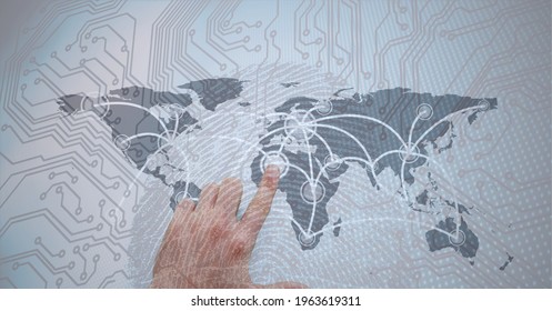 Composition of man touching virtual screen with world map and circuit board elements. global connections, data processing and technology concept digitally generated image.