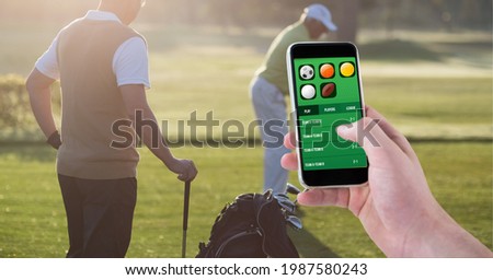 Composition of man using smartphone with sports app over two golf players. sport and competition concept digitally generated image.