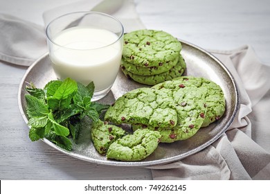 Composition With Mint Chocolate Chip Cookies And Milk On Table