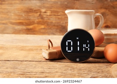 Composition with modern kitchen timer, dishware and ingredients on wooden background - Powered by Shutterstock - Get 15% off with code: PIKWIZARD15