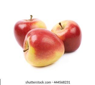 Composition of multiple ripe red and golden jonagold apples isolated over the white background