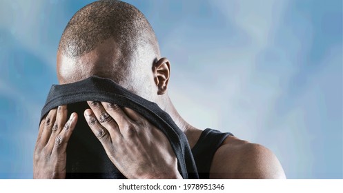 Composition Of Muscular Strong Man Wiping Face With T Shirt. Sport, Fitness And Active Lifestyle Concept Digitally Generated Image.