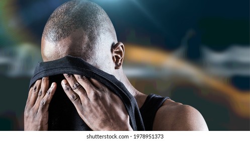 Composition Of Muscular Strong Man Wiping Face With T Shirt. Sport, Fitness And Active Lifestyle Concept Digitally Generated Image.