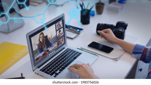 Composition of network of blue hexagons over woman on laptop video call. global connection, technology and digital interface concept digitally generated image.