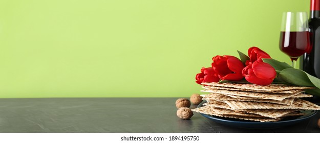 Composition With Passover Matzos On Green Background, Space For Text. Pesach Celebration