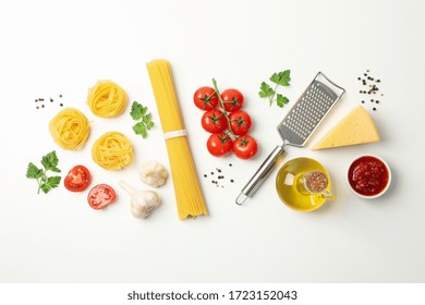 Composition with pasta and ingredients for cooking on white background, top view - Powered by Shutterstock