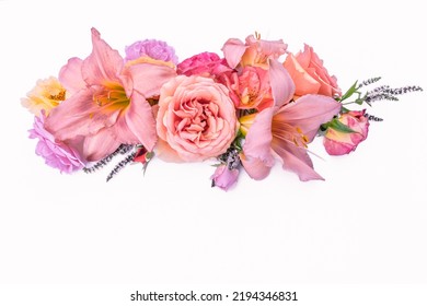 Composition Of Pink Flowers On A White Background. Roses, Lilies, Mint Grass, Arrangement Of Flowers, Arrangement Of Pink Flowers On The Table. Pastel Colors. Valentine's Day. Mothers Day. Women's Day