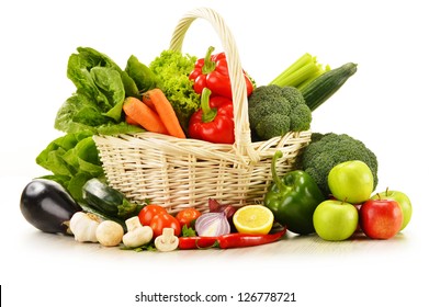 Composition With Raw Vegetables In Wicker Basket Isolated On White