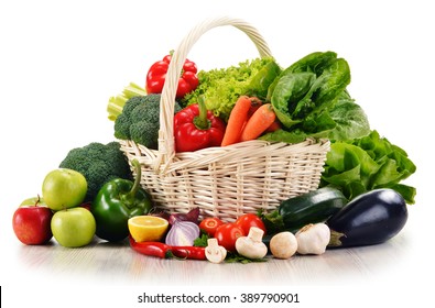 Composition with raw vegetables in wicker basket isolated on white - Shutterstock ID 389790901