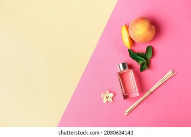 Composition with reed diffuser on color background