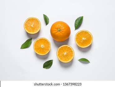 Composition with ripe oranges on white background, top view