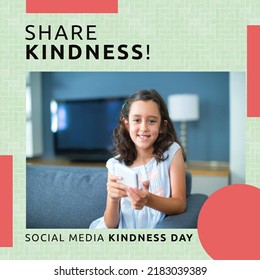 Composition of share kindness and social media kindness day text over biracial girl using smartphone. Social media kindness day and celebration concept digitally generated image. - Powered by Shutterstock