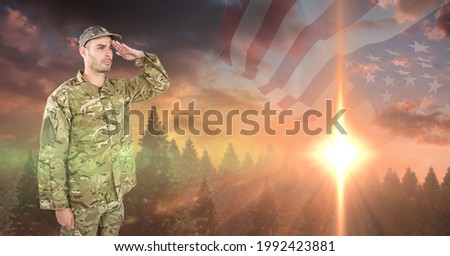 Composition of soldier saluting against sunset and american flag. united states of america patriotism and independence concept digitally generated image.