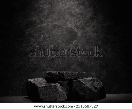 composition of stones with texture on dark background for podium